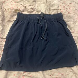 Champion, size medium, blue skirt